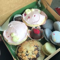 Box of lemon cakes, chocolates, cookies, and macarons  at Sweet Maresa's in Kingston
