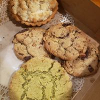 Chocolate chip walnut cookies, pistachio cookie, and a tart. at Sweet Maresa's in Kingston