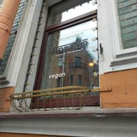 Outside view with the name at Ananda Cafe in St Petersburg