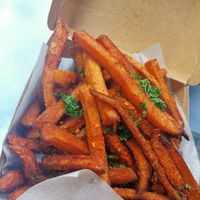 Zoete aardappel frietjes €9,00 at HUMM Restaurant in Antwerpen