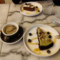 Carrot cake (top) and matcha chocolate (bottom) with coffee at HUMM Restaurant in Antwerpen