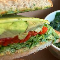 Avocado Panini. bread toasted with sautéed spinach at Busboys and Poets - Langston Lofts in Washington