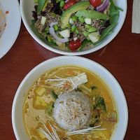 Greek salad and Penang curry bowl at Manna Kitchen in Lisle