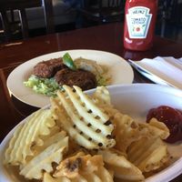 Waffle fries and crab cakes  at Manna Kitchen in Lisle