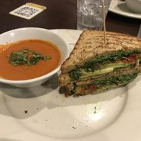 Vegan tomato soup and avocado panini at Busboys and Poets - Mount Vernon Triangle in Washington
