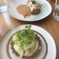 Fennel tartlet and spring roll (background)  at the friendly kitchen in Paris