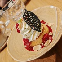 Almond financier & verbena chantilly

Raspberry coulis, lemon curd, slivered almonds, timut pepper, tuile at the friendly kitchen in Paris