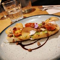  Gluten free focaccia with lemon thyme & aragula pesto

Homemade preserved cherry tomatoes, cream cheese « les nouveaux affineurs », savory peach pickles, wild almonds at the friendly kitchen in Paris