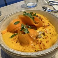 Yellow carrot espuma with saffron  at the friendly kitchen in Paris