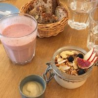 BRUNCH: Homemade granola with vegan almond yogurt, apple butter and bread, banana and raspberry smoothie. at the friendly kitchen in Paris
