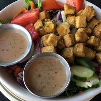 Brunch salad with tofu cubes  at The Grit in Athens