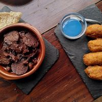 Tapas selection - chorizo and croquettes at A Raices in Gran Canaria