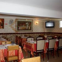 Indoor seating at Taj a Palhota in Estoril