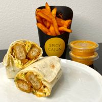 spicy chicken honey wrap + Cajun fries w/crack sauce (plated at home) at Moe Vegan in Kent