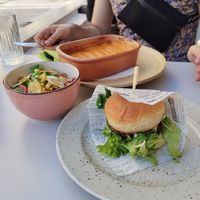 Truffle burger with seasonal salad and shepherd's pie in the back at VEG in Split