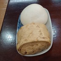 Black sesame bun above and mixed nuts raisins bun below at HéJiā Běi Ān SùShí DiǎnXīn 合家北安素食點心 in Taipei