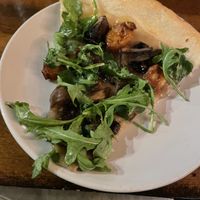 Underdone pizza. Mushrooms were good texture but bland. Sweet garlic purée with 3-5 cloves of garlic per slice (in a bad way somehow). One note and not a good one    at Pickled Fish in Long Beach