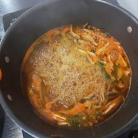 Some kind of soup with a lot of different mushrooms. at Dotori Kalguksu in Seoul