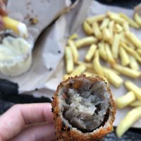 Vegan Goulashkroket met gebrande paprika's en aubergine.  at Toon's in Hengelo