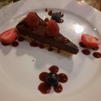 Rich chocolate tart with fruit at The Bull on Bell Street in Henley-on-thames