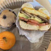 Half bagel #6 vegan with blueberry muffin and clementine. (I had already eaten the other half before the photo. ☺️)  at UT47 Manhattan in New York City