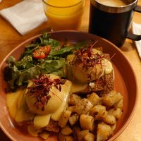 Vegan bacon tofu egg benedict, orange juice and cappuccino. at UT47 Manhattan in New York City