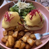 Vegan eggs Benedict with runny yolk with a nice salad and tasty homefries.  at UT47 Manhattan in New York City