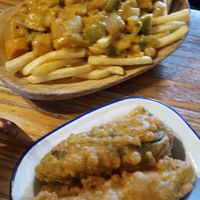 Fried gherkins. Squash and coconut curry on fries. at Gibson's in York