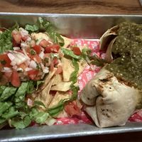 Kind of messy picture but it was a hibiscus burrito and chips and salsa  at Taco Taco in Monteverde