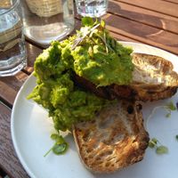 Smash avocado on sourdough at Little Cove Espresso in New Territories