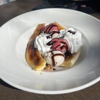 Banana split!! With vegan ice cream, vegan chocolate, coconut whip, and granola    at Trevor's at the Tracks in San Juan Capistrano