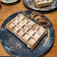 Pistachios-filled waffle with chocolate-hazelnut spread on the side at Pardon in Brussels