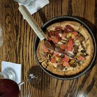 Vegan cheeseburger deep dish pizza at UNO Pizzeria in Orlando