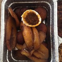 part of mixed plate: fried plantains and yeast balls with spicy sauce (take away) at Patacon-Obi - Falafel Café in Stuttgart