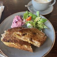 Hummus/falafel toastie with an oat chai latte  at Cafe Etch in Middlesbrough