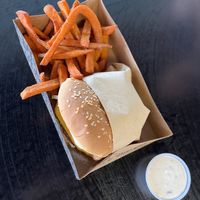 bacon burger with sweet potato fries and ranchh  at Nice Burger - Costa Mesa in Costa Mesa