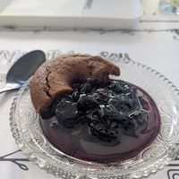 Surprise, complimentary mini dessert with black cherries and spiced cookie (vegan) at Tis Mammis Sou in Rhodes