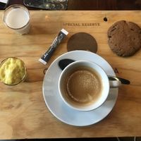 Coffee, chocolate chip cookie, avocado “custard” and vegetable milk at Atelier Flori in Bruges