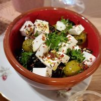 Olives with vegan cheese at Atelier Flori in Bruges