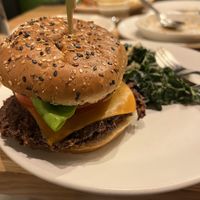 Vegan double cheeseburger with kale salad  at True Food Kitchen in New Orleans