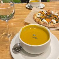 Vegan squash soup + pizza  at True Food Kitchen in New Orleans