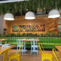 Interior is gorgeous. The sign on the wall reads Eat more color (obviously meaning veggies) at True Food Kitchen in New Orleans