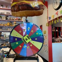 Wheel of prizes for anniversary celebration!  at DC Vegetarian in Portland