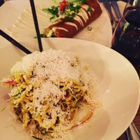 Curry noodles and burrito at Raw Aura in Mississauga