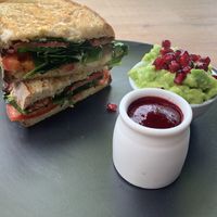 Smokey tempeh, tomato, rocket with a homemade veganaise with a side of avocado   at Cafe Sunshine & Salama Tea in Sunshine