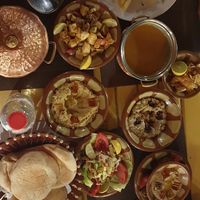 Lentil soup, hummus, tamenya & Tahini, babaganoush, chips, spicy potatoes at Al Sahaby Lane in Luxor