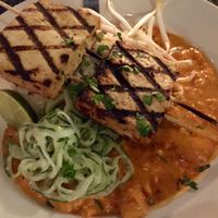Vegan option of the dinner special at Nine Mile West tonight: Grilled tofu skewers, with mango, peppers, and onion in a Sriracha coconut sauce; served with rice, and finished with cilantro, bean sprouts, and a cucumber salad.  at Nine Mile Montford in Asheville