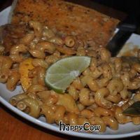 Raggy Road: Cajun Tofu with sauteed red, gold, & green peppers, squash & zucchini in a white wine creamy, dairy-free, coconut chipotle sauce. at Nine Mile Montford in Asheville