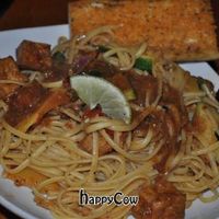 Nine Mile: Jerk tofu with fresh ginger, fire roasted tomatoes, jalapeño peppers, squash, & zucchini, sauteed with white wine & butter over linguine. at Nine Mile Montford in Asheville