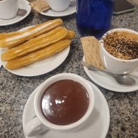 Churros + chocolate + cappuccino at Petritxol Xocoa in Barcelona